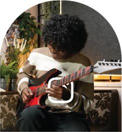 Alwin Anpu playing guitar